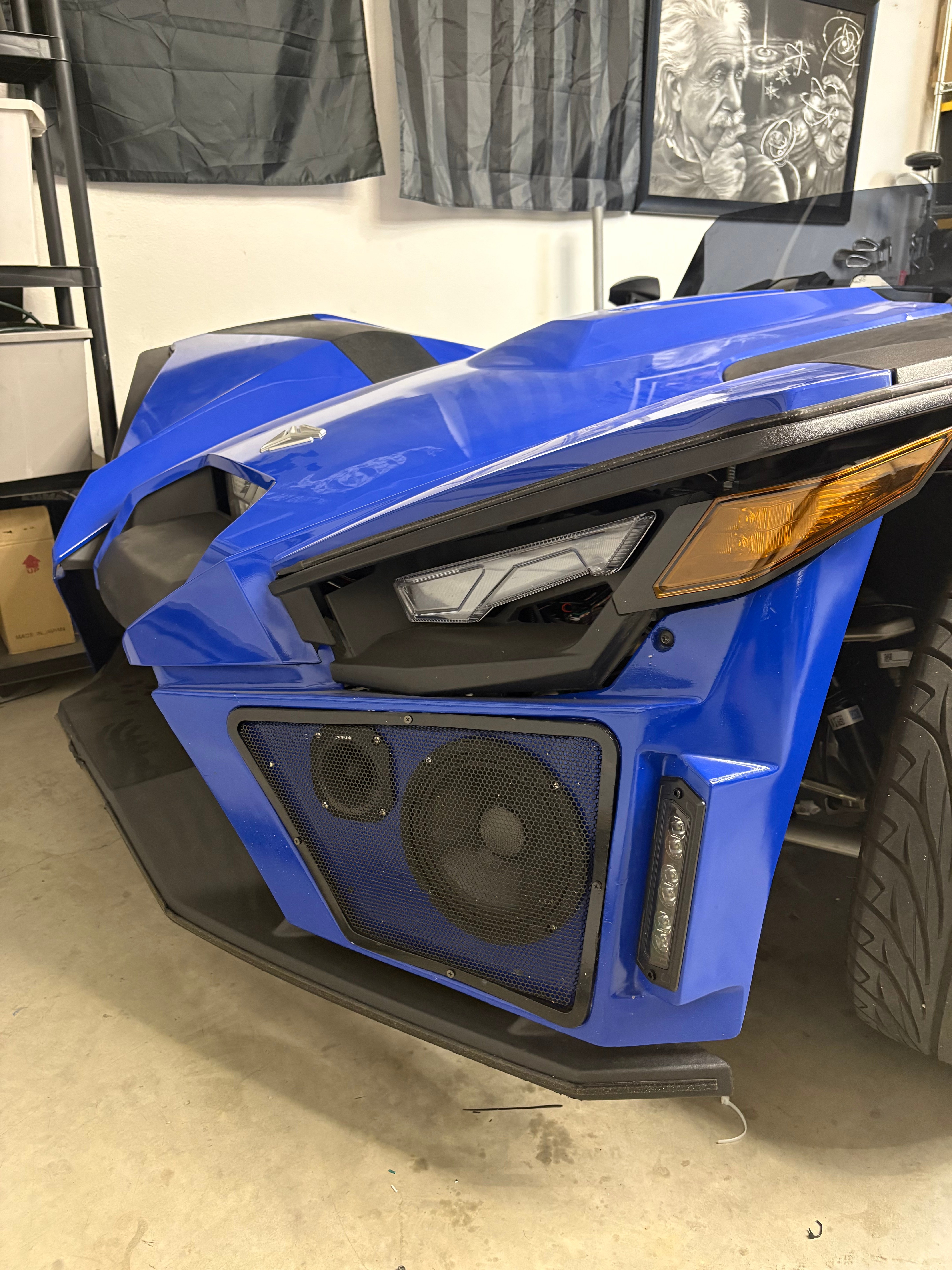 Custom dual-speaker enclosure in a Polaris Slingshot nose