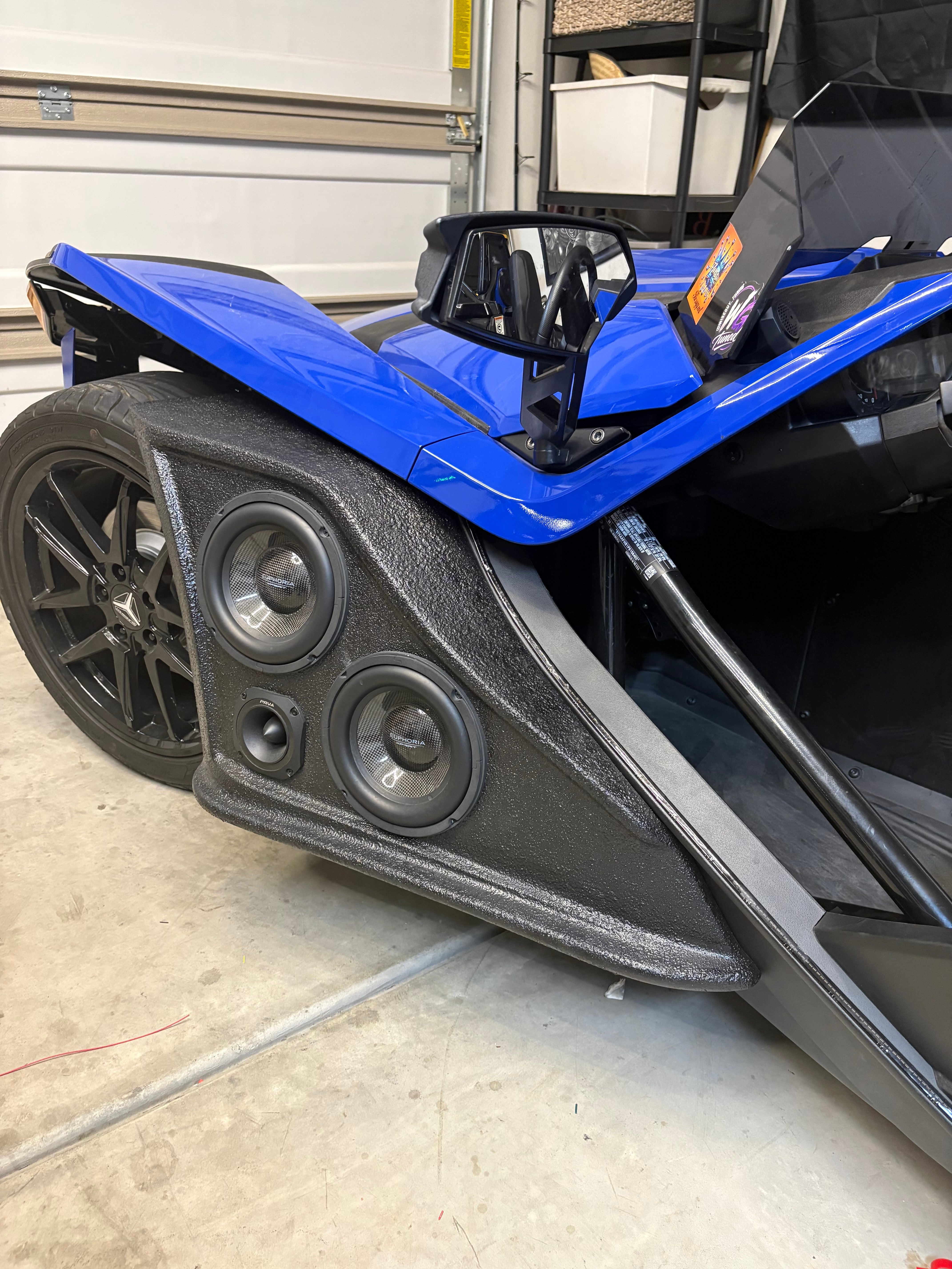 Custom side speaker pods on a Polaris Slingshot